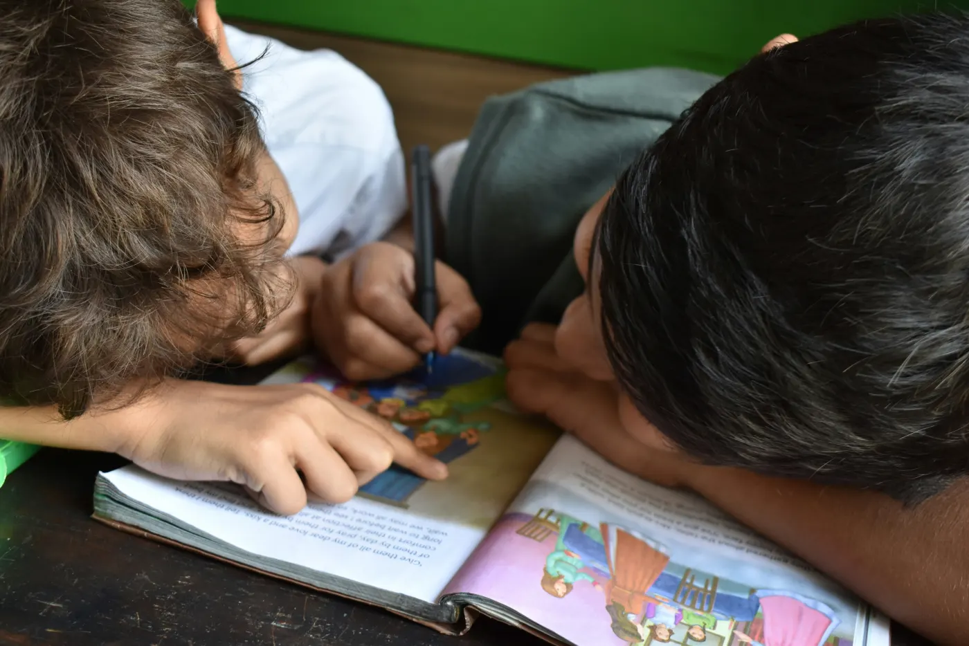 Two children reading together